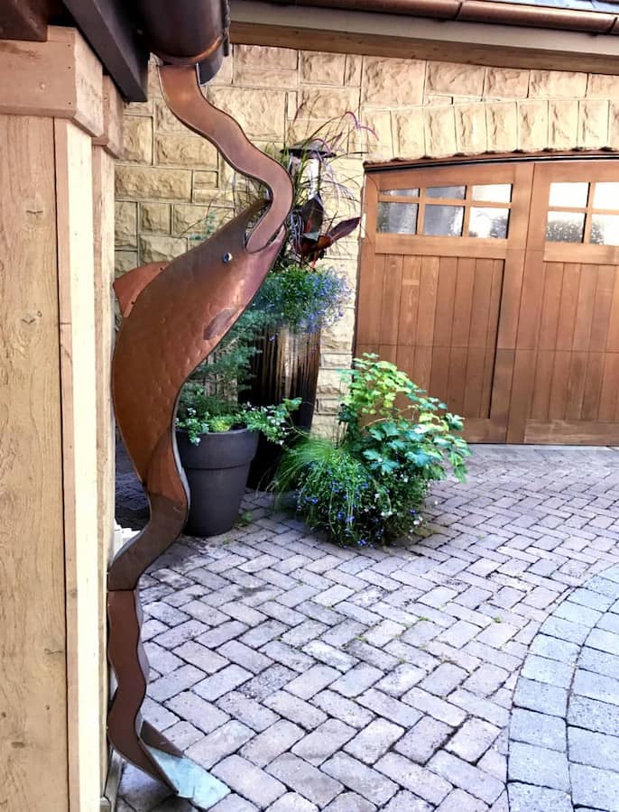 Copper gutters with bronze patina