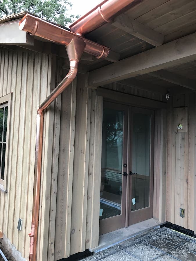 Copper Half-Round Gutters with Round Downspout